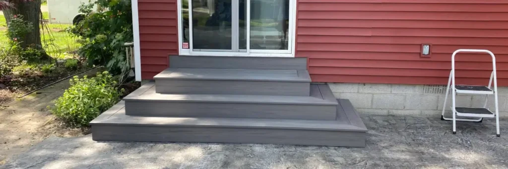 Composite decking steps with gray finish built by Union Properties in Huron, MI