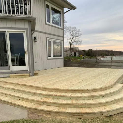Low-maintenance composite decking options and cost to build a deck in Michigan by Union Properties | Deck Builder & General Contractor in Port Huron in Port Huron, MI