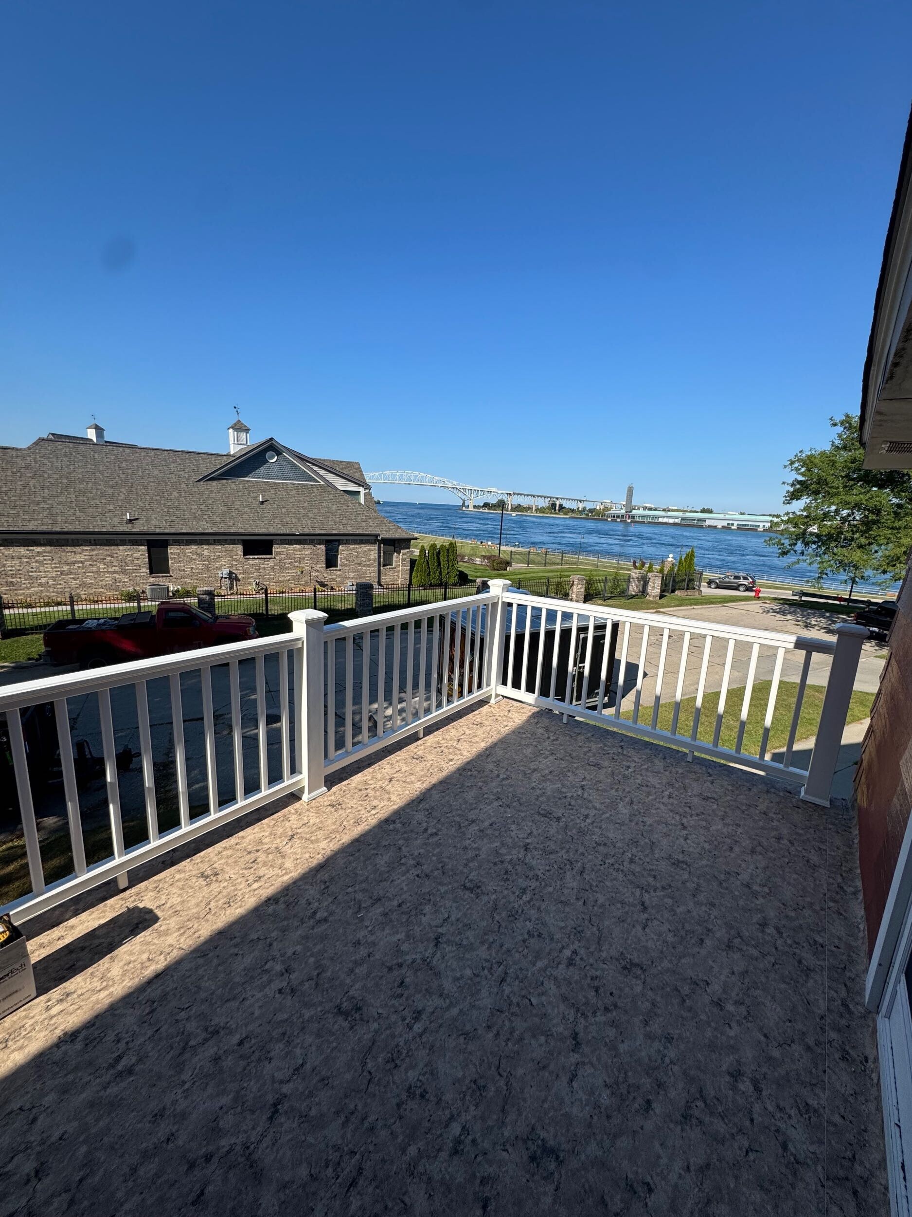 Balcony with waterfront view multi-level decks Michigan service in Michigan by Union Properties