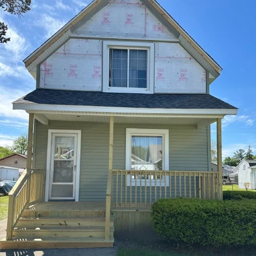 Front porch deck addition on residential home by Union Properties in Michigan