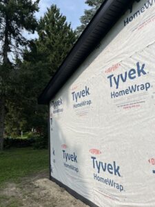 house exterior covered with tyvek homewrap before siding installation in Port Huron